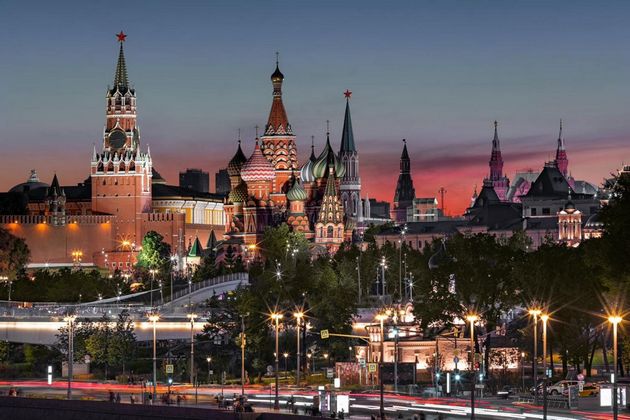 An evening view of the Moscow Kremlin, the Red Square, the Spasskaya tower, the Saint Basil’s Cathedral and the State Historical Museum