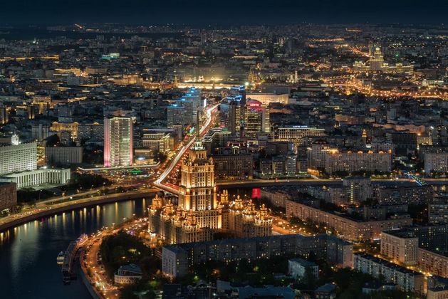 The panorama of the high-rise building of the “Ukraine” Hotel in Moscow by night