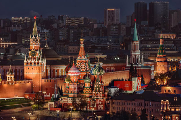An evening view of the Moscow Red Square, the Saint Basil’s Cathedral and the Spasskaya tower