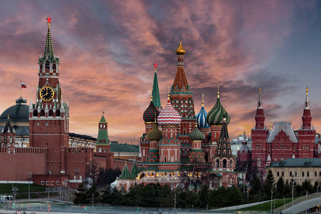 A view of the architectural complex of the Moscow Red Square: the Spasskaya tower, the Saint Basil’s Cathedral and the State Historical Museum