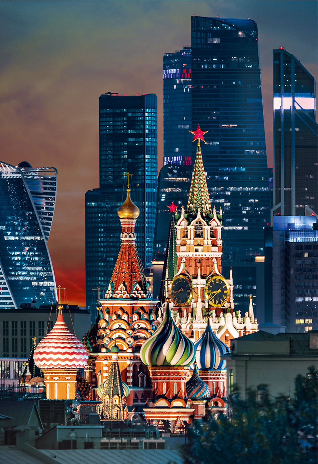 A view of MIBC “Moscow-City” through the Moscow Kremlin towers in the sunset